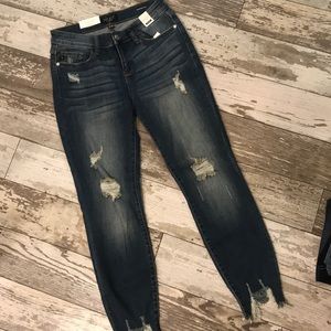 Shark bite skinny jeans
